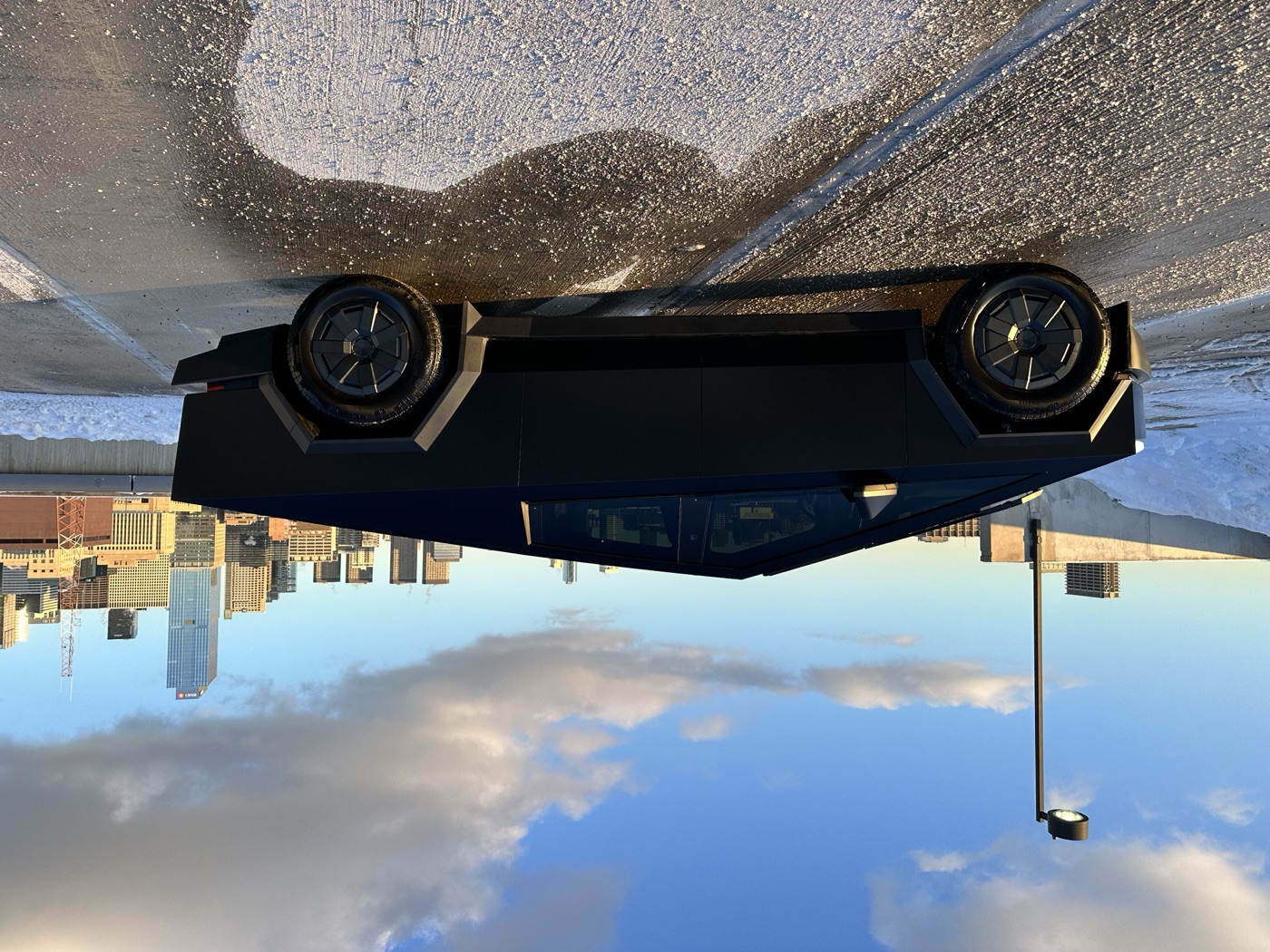 Tesla Cyberbeast full side profile with downtown Chicago backdrop