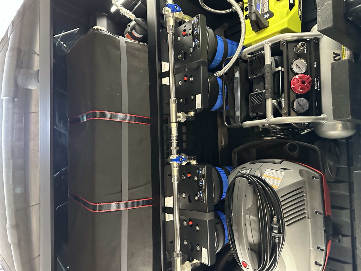 Mobile detailing equipment — pressure washer, air compressor, and DI filter system